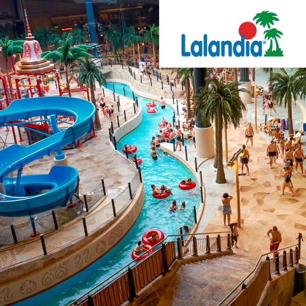 AQUADOME™ is a tropical water park with fun water slides, a wave pool and warm whirlpools. Children and adults swimming, relaxing and having fun.