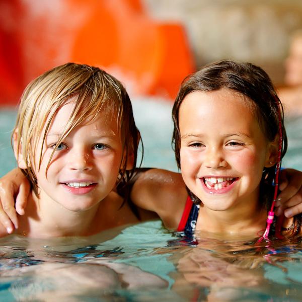 Play in the waves or float with the water current. Try the best water slides or enjoy the heated pools, just like this girl and boy. Quite simply the world's best family holiday for children at LEGOLAND® Billund Resort.
