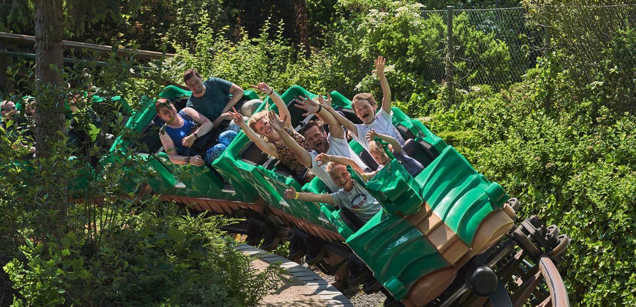 Ride the green dragon rollercoaster in LEGOLAND® Park. Or try some of the other 50 rides for children and families.