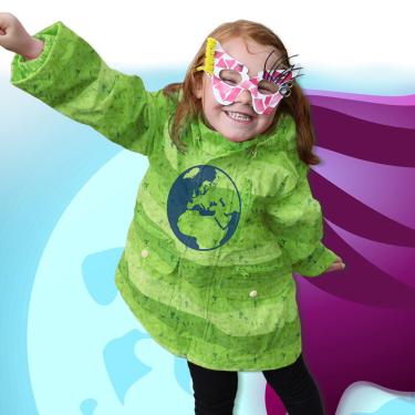Explore the Økolariet's many exciting exhibitions, dressed as e.g. a superhero like this girl. Children and adults alike can immerse themselves in fun ways to explore exciting topics, from climate change to healthy eating.